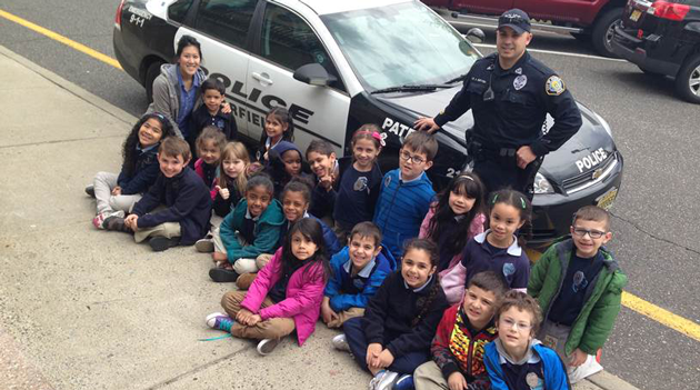 Garfield Police Officer talks to BASCS El.